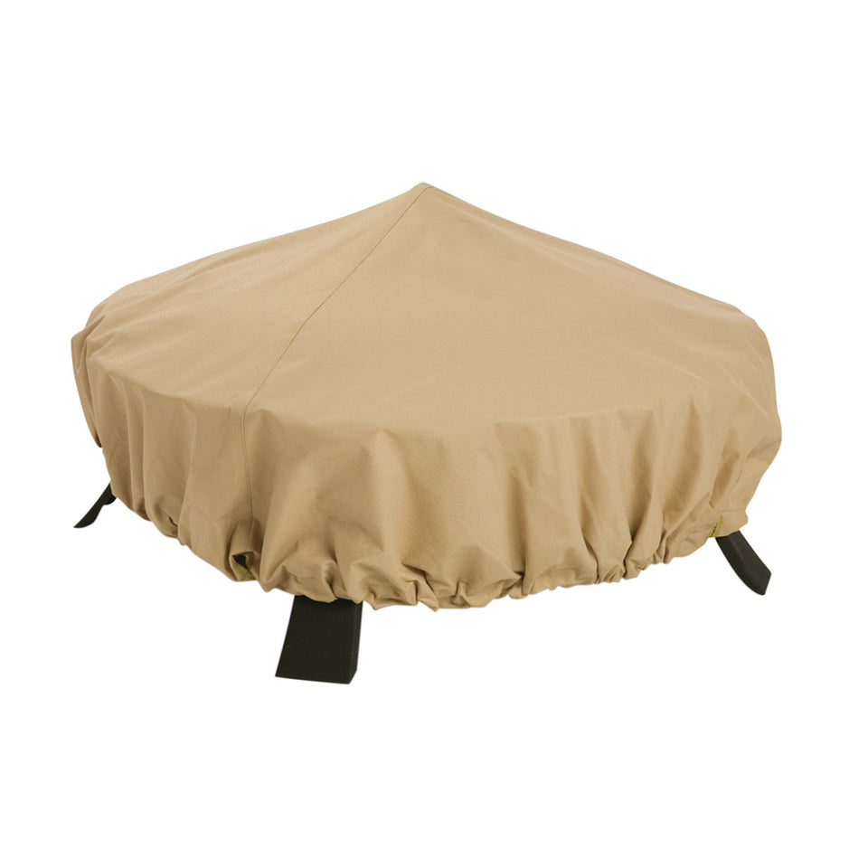 Classic Accessories Terrazzo 44-inch round fire pit cover on a patio.