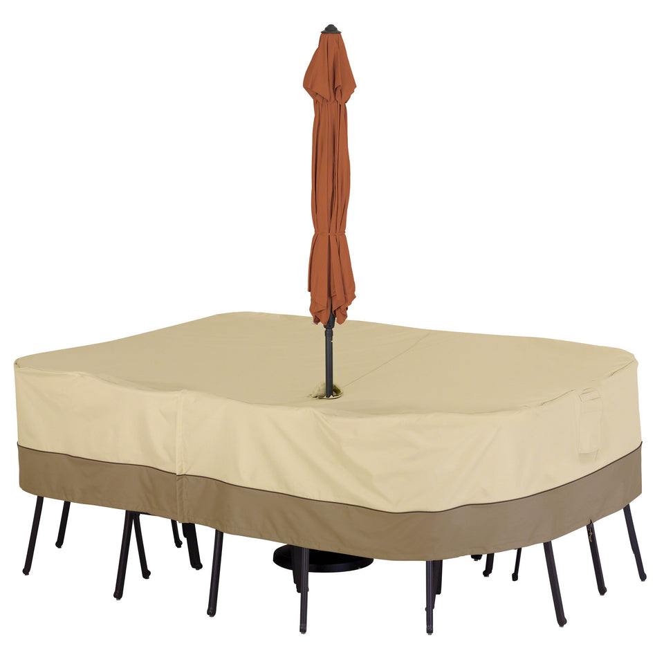 Classic Accessories Veranda table cover with umbrella hole protects pebble outdoor table.