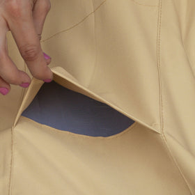 Classic Accessories Veranda cover with click-close straps secures against wind.