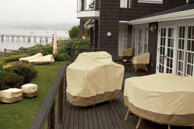 Classic Accessories Veranda click-close straps secure the cover on windy days.