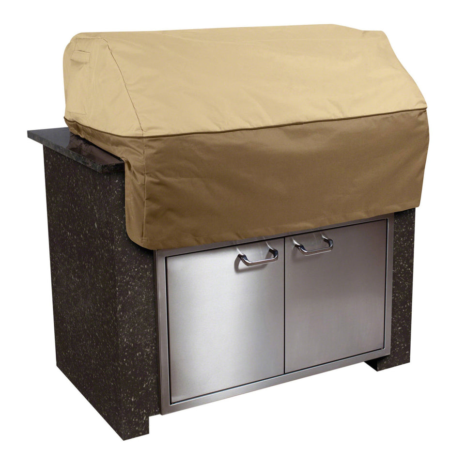 Classic Accessories Veranda 32-inch grill top cover on island setup protects from weather.