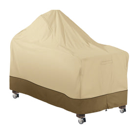 Classic Accessories Veranda 60-inch Kamado cover protecting a grill from rain and sun.