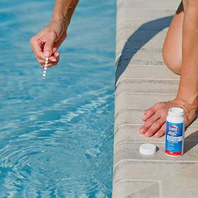 CLOROX Pool&Spa dip strip into water for quick analysis.
