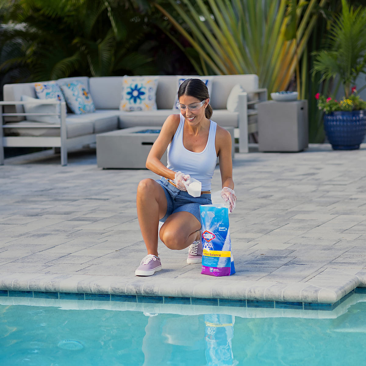 Clorox Pool&Spa Perfect Balance bottle being poured for easy dosing
