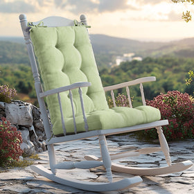 Codi rocking chair cushions in sage on a rocker provide outdoor comfort.