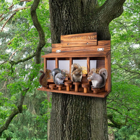 CODIN Squirrel Feeder Table burnt pine finish blends with yard scenery.