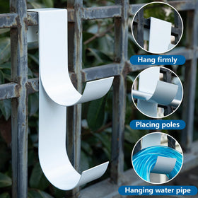 Codree fence hook suspending pool hose, demonstrating versatile hanging.