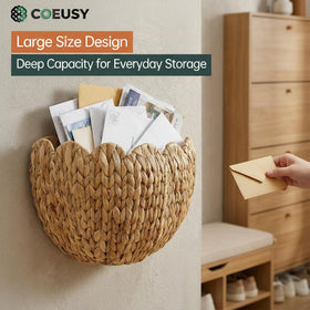 Coeusy wall basket in bathroom stores towels and essentials neatly.