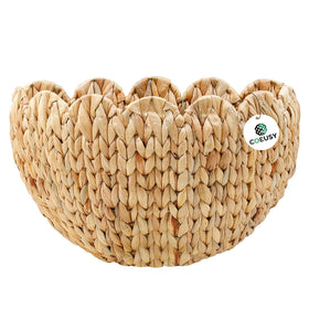 Coeusy scalloped wall basket close-up shows natural water hyacinth texture for stylish storage.