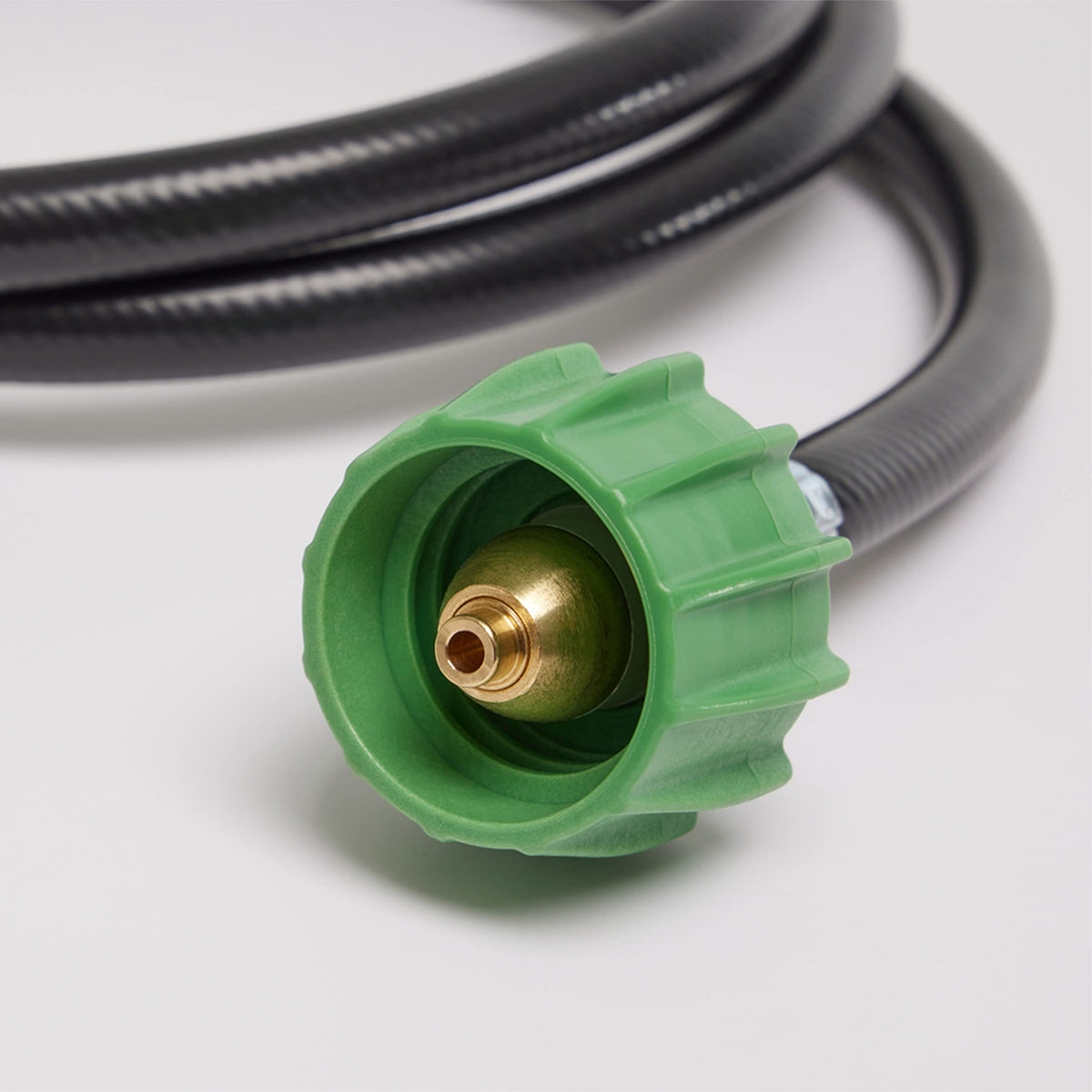 Coleman stove and lantern hose setup improves outdoor cooking and lighting flexibility.