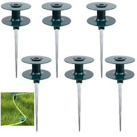 Coloch hose guard stake protecting flower beds and guiding the hose