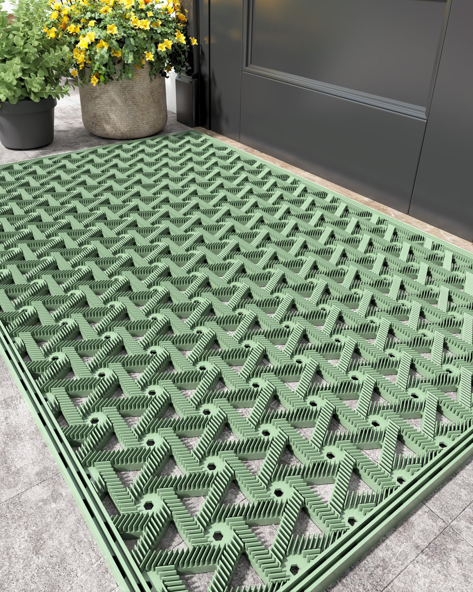 Color&Geometry outdoor door mat with drainage traps dirt at the doorstep.