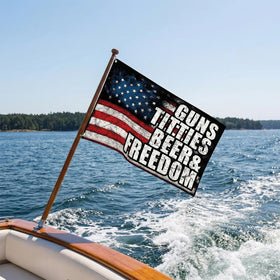 Colorato Guns Beer & Freedom flag provides a patriotic party decoration for celebrations.