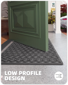 Color&Geometry mat installed by back door; handles mud and debris from outdoor footwear.