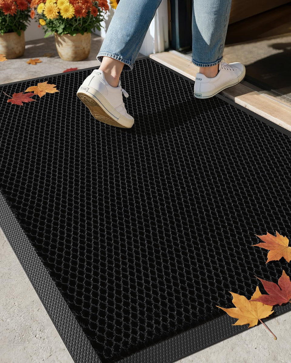 Color&Geometry 24x36 black doormat at entry traps dirt effectively.