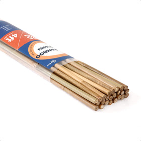 COLOtime 4ft bamboo stake in soil supporting climbing plants in the garden