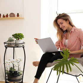 Cometofit two-tier plant stand indoors corner display demonstrates compact space-saving solution