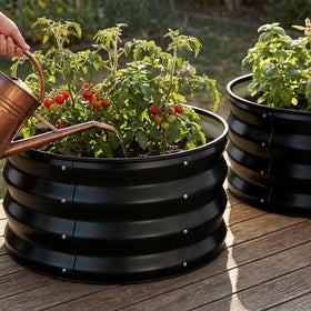 COMHOMA open-bottom drainage design enabling natural water flow for roots.