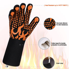 Comsmart gloves with long cuffs protect wrists during oven and grill tasks.