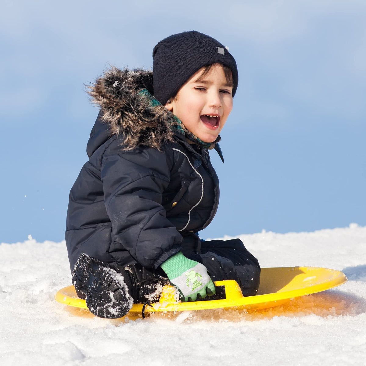 CoolJob ThinkGreen kid using gloves outdoors in garden and yard
