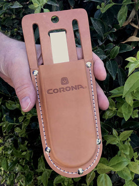 Corona slotted end belt fastening allows quick attachment to a belt.