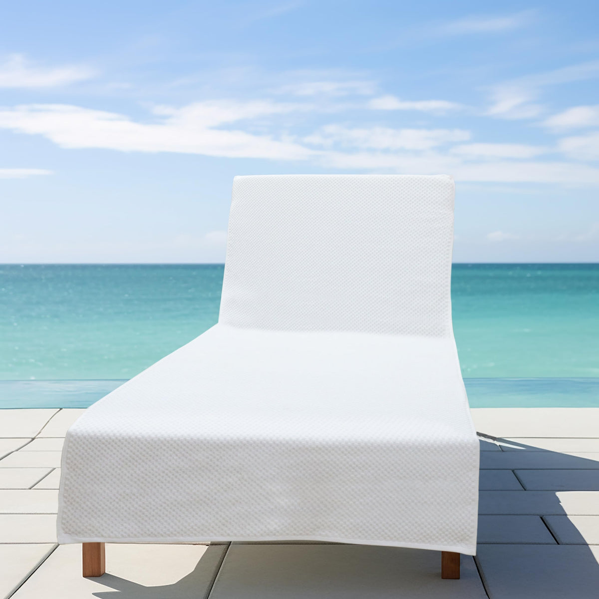 Cotton Craft absorbent terry lounge cover in white ready for drying.