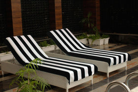 Cotton Craft chair cover pocket keeps the cover secure.