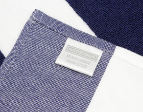 Cotton Craft navy-white cabana stripe close-up showcases durable fabric.