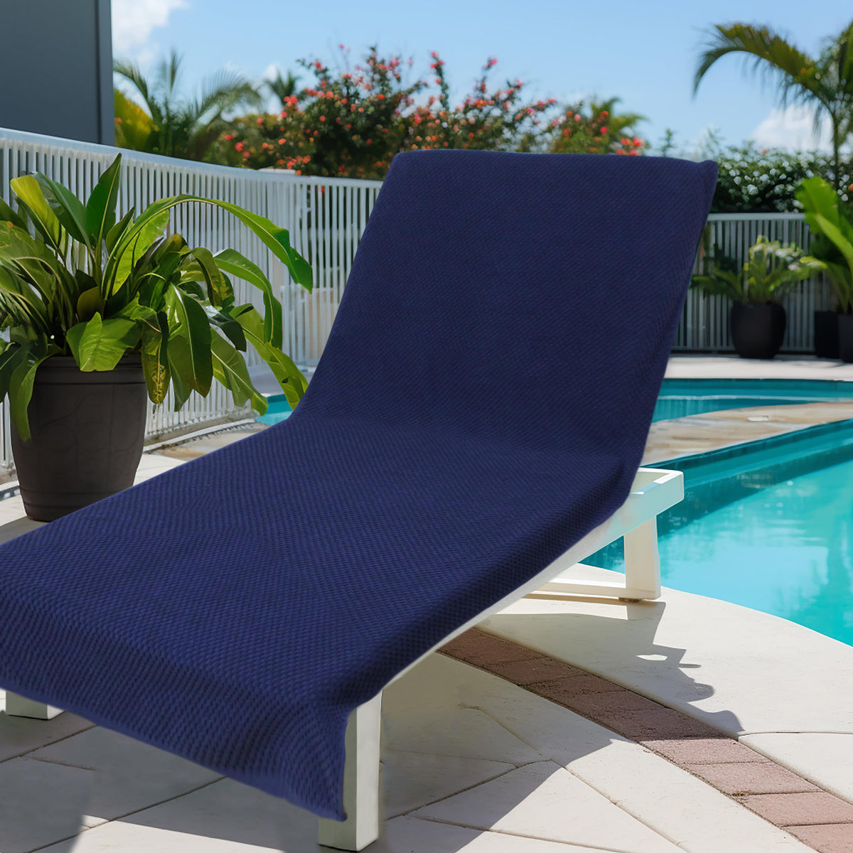 COTTON CRAFT quick-drying lounge chair cover for pool or beach days.