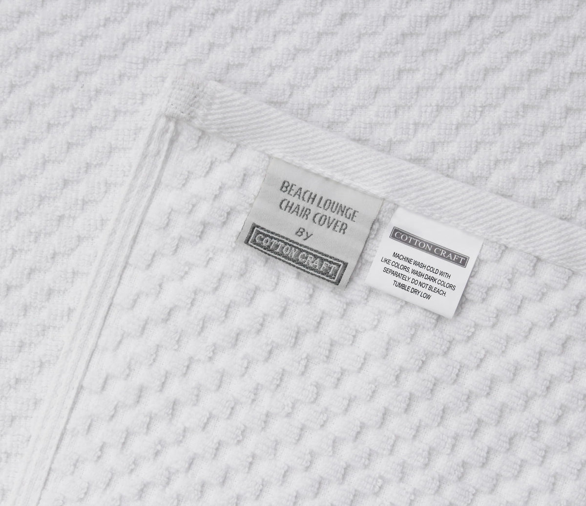 Cotton Craft white lounge chair cover adds fresh poolside aesthetic.