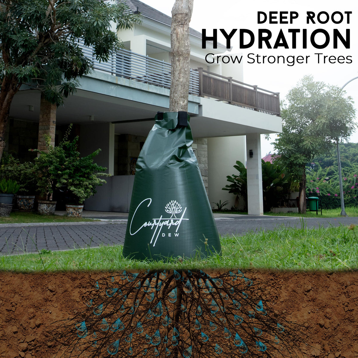Courtyard Dew tree watering bag filled and secured on trunk with hose connection for easy refills.