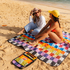 Cozy Club outdoor mat laid on grass during picnic