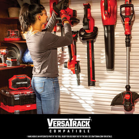 Craftsman CMCK197M1 kit in use showing trimmer and blower versatility
