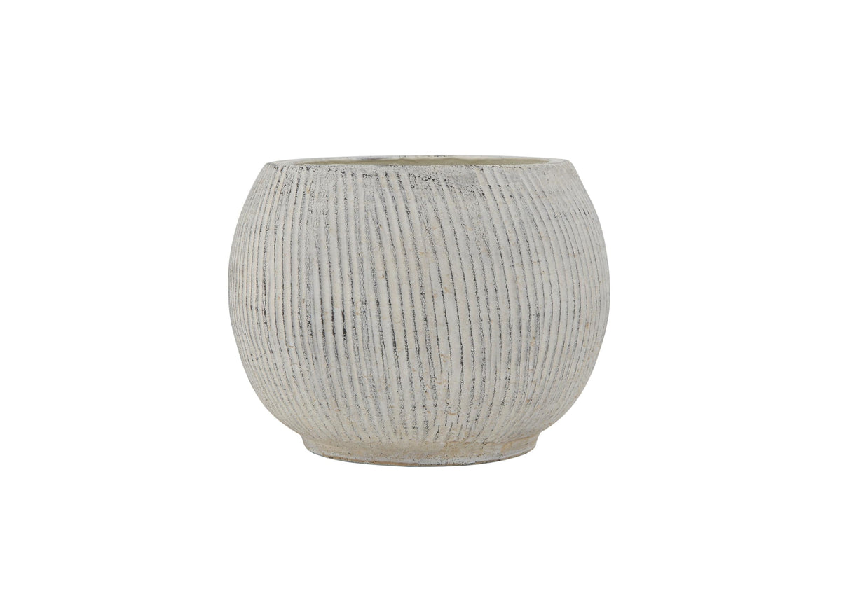Creative Co-Op planter with no drainage holes keeps surfaces tidy.