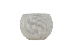 Creative Co-Op planter with no drainage holes keeps surfaces tidy.