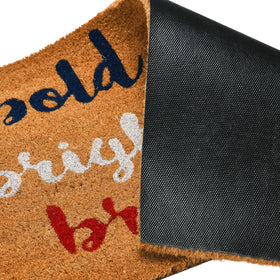 Creative Co-Op doormat displays bold stripes brave hearts for a welcoming vibe.