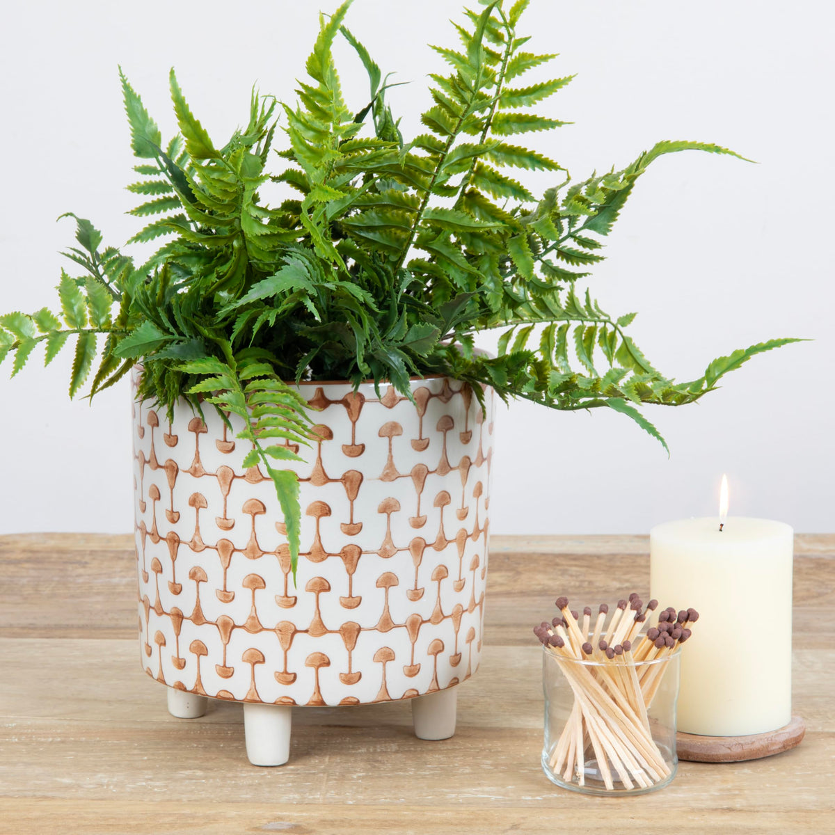 Creative Co-Op footed planter with 8 inch diameter for stylish display