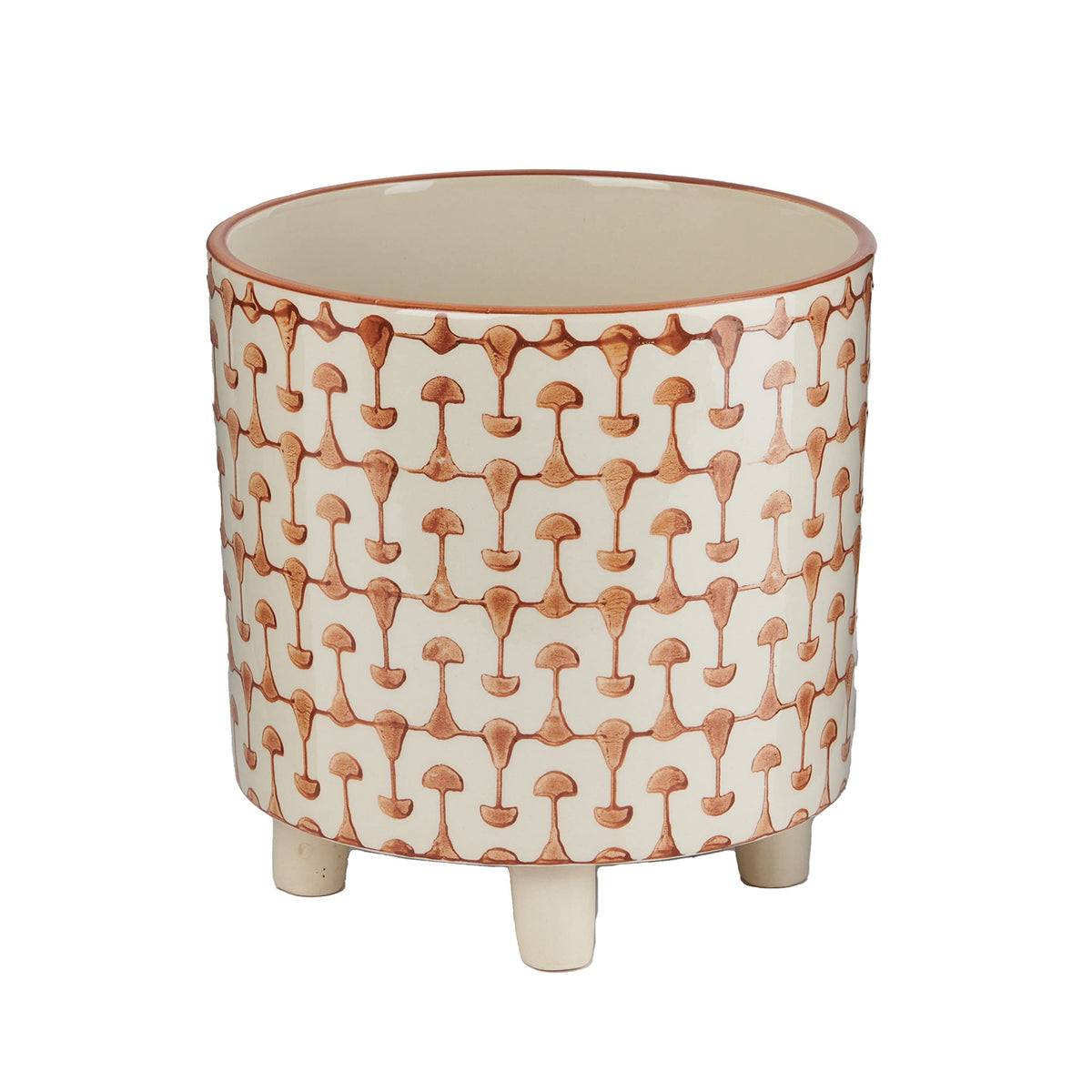 Creative Co-Op footed stoneware planter with abstract rust-white print elevates small herbs