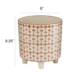 Creative Co-Op footed stoneware planter shows abstract print on legs for mid-century vibe