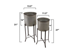Creative Co-Op large planter holds tall greenery with a dramatic height.