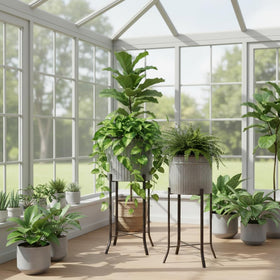 Creative Co-Op planters in silver and black finish suit indoor or covered spaces.