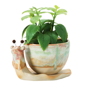 Creative Co-Op snail planter drainage-hole-detail reveals glaze texture and craftsmanship
