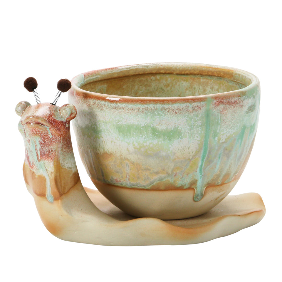 Creative Co-Op snail planter front view shows charming garden decor with practical drainage for plants