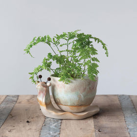 Creative Co-Op snail planter styled-garden living-space adds whimsy to balcony or windowsill