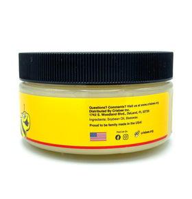 Crisbee Griddle Seasoning bottle pour, demonstrating easy coating for cast iron.