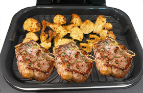 Croask dual-handle design enables easy lift from the Ninja Foodi grill.