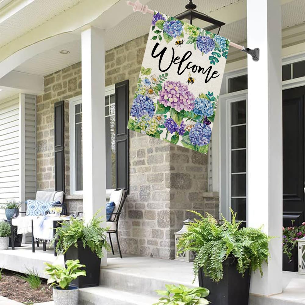 CROWNED BEAUTY flag hanging on a porch for outdoor display