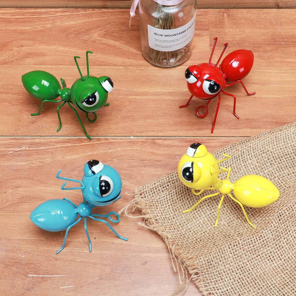 Cruis Cuka blue ant yard art figurine complements various exterior decor themes