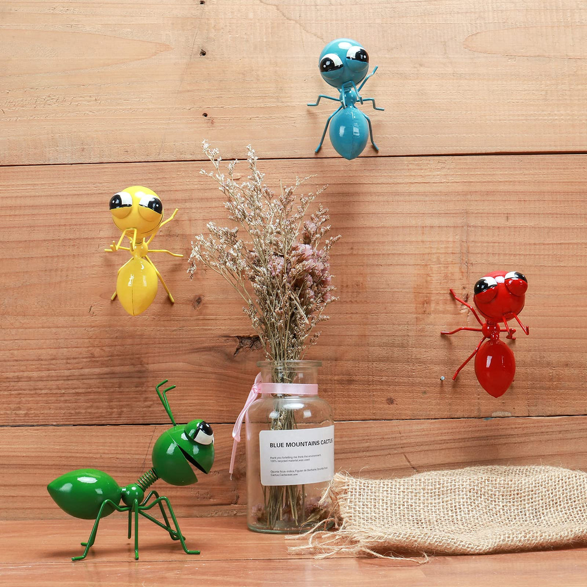 Cruis Cuka yellow hook-bottom ant yard art enhances garden entryways