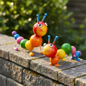 Cruis Cuka colorful caterpillar garden statue enhances outdoor spaces and living areas.